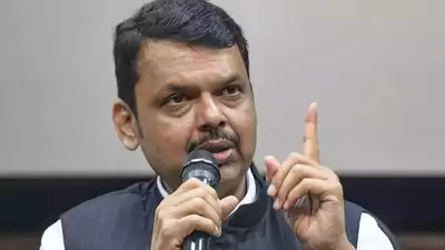 Chief Minister Devendra Fadnavis addressing a gathering after laying the foundation stone of 'Parivahan Bhavan' in Mumbai.